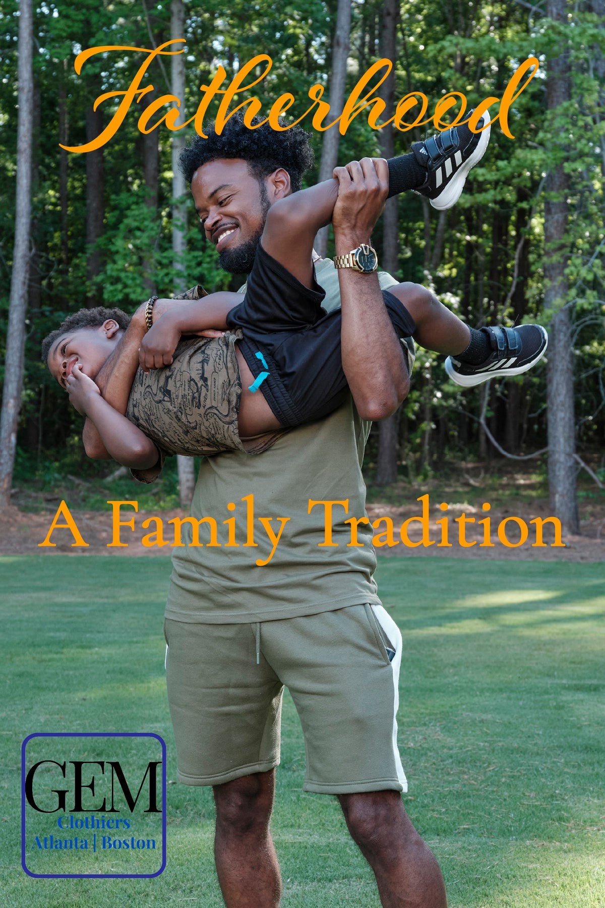 A man outdoors carrying a child on his shoulders, with large overlaid text reading 'Fatherhood' and 'A Family Tradition.' The scene is set in a wooded park area, and a small 'GEM' logo appears in the lower-left corner.