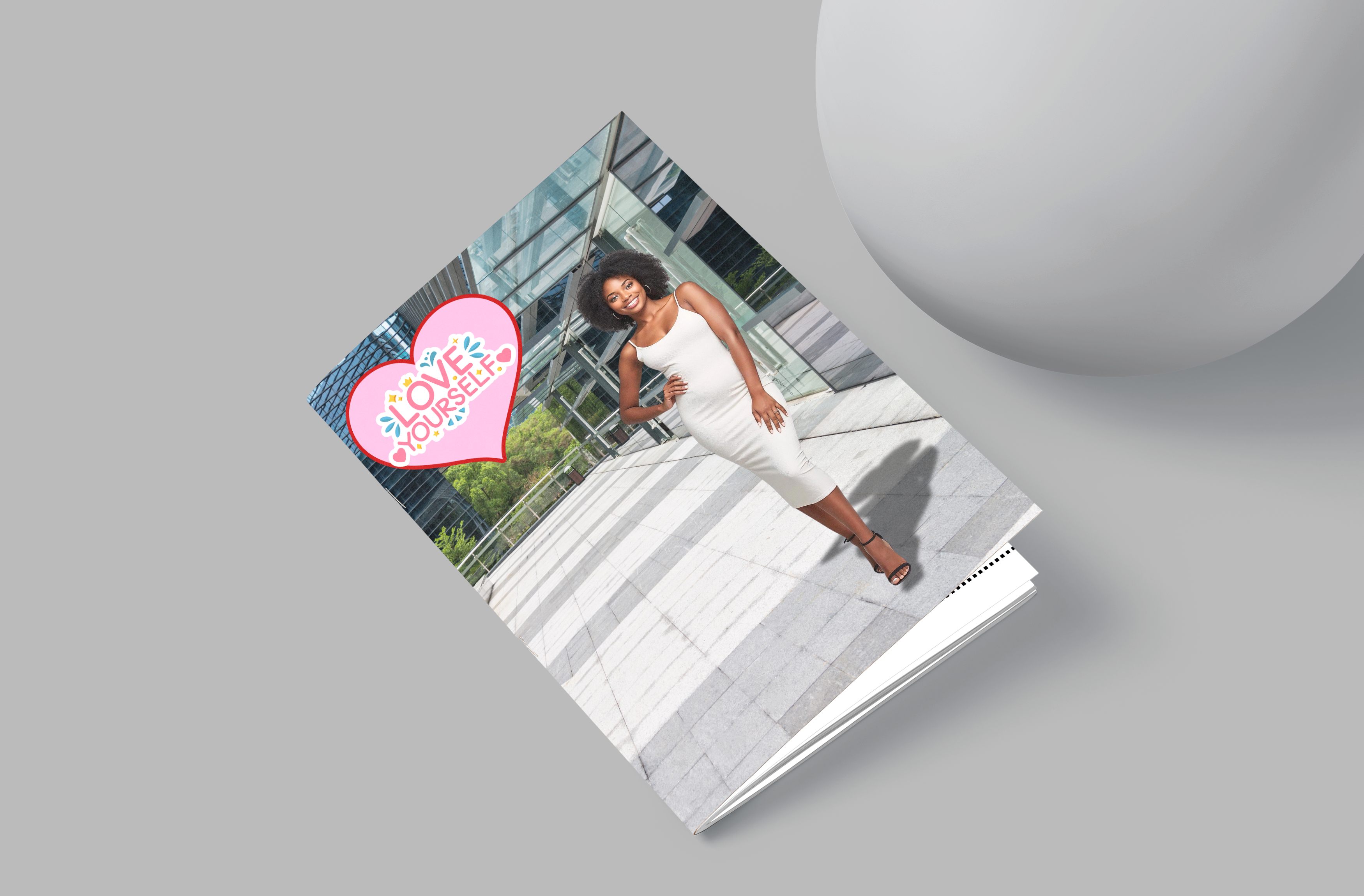 Book cover with a woman in a white dress and a heart-shaped sticker on a gray background