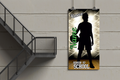 Promotional banner with a silhouette of a person holding a diploma against a light gray wall.