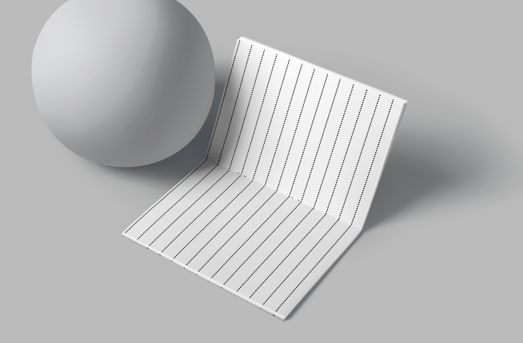 Sheet of lined paper with a sphere on a gray background