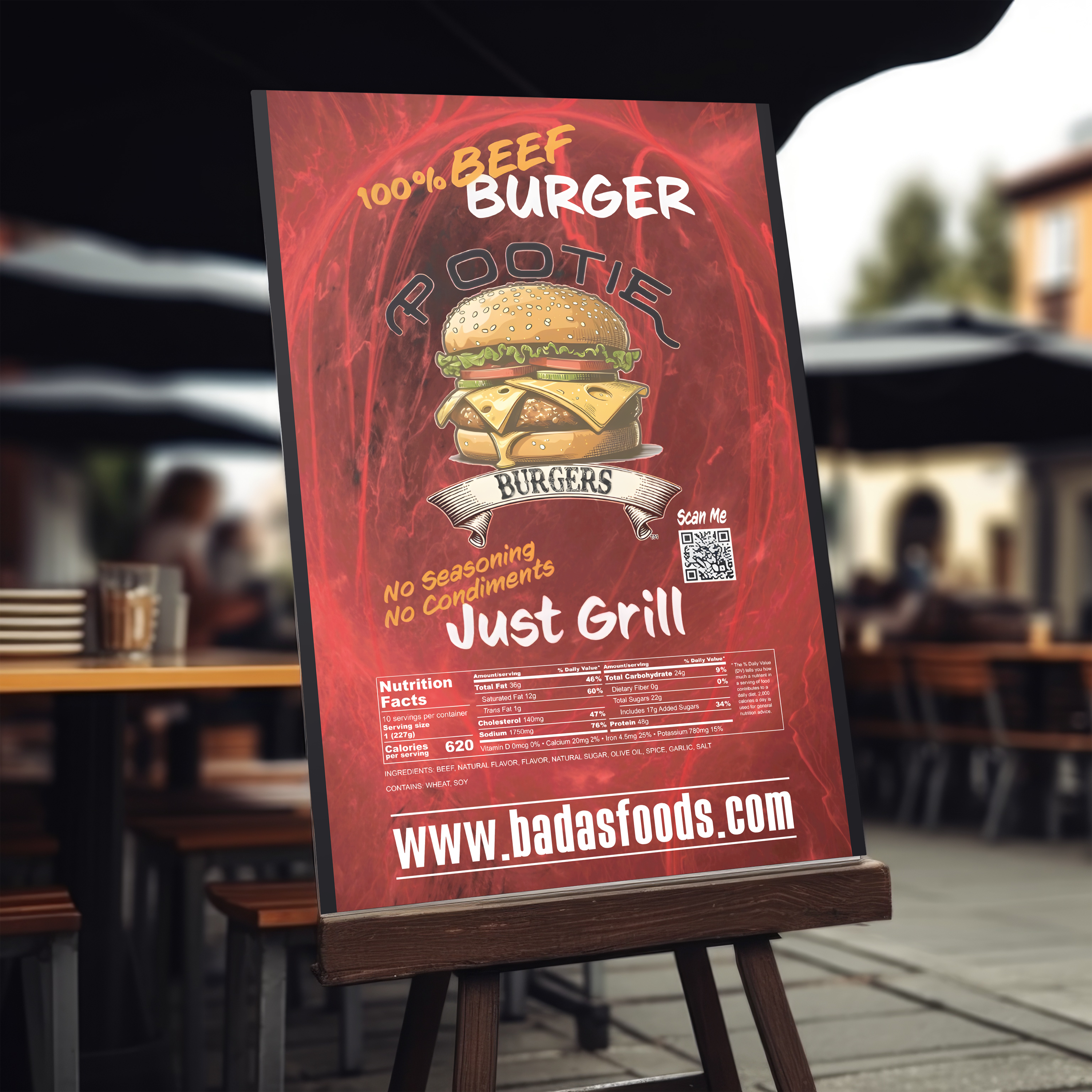 Promotional sign for Rootie Burgers with a blurred outdoor restaurant background