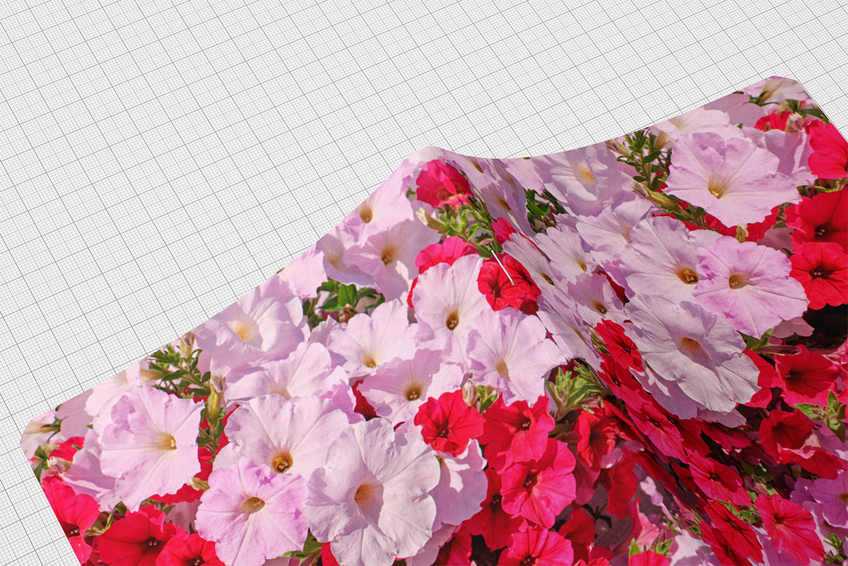 Garden in Bloom floral SquareFold journal featuring vibrant pink, magenta, and lavender impatiens flowers, displayed with a pen and botanical accessories.