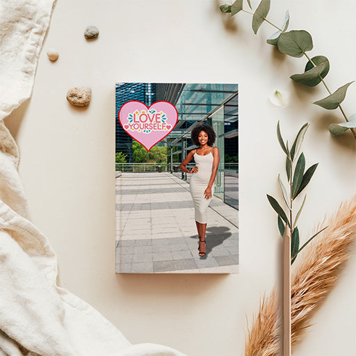 Love Yourself Artist Series journal featuring a woman in an elegant white dress in a modern outdoor setting, with a colorful heart-shaped self-love graphic.