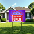 Open sign on a lawn in front of a house