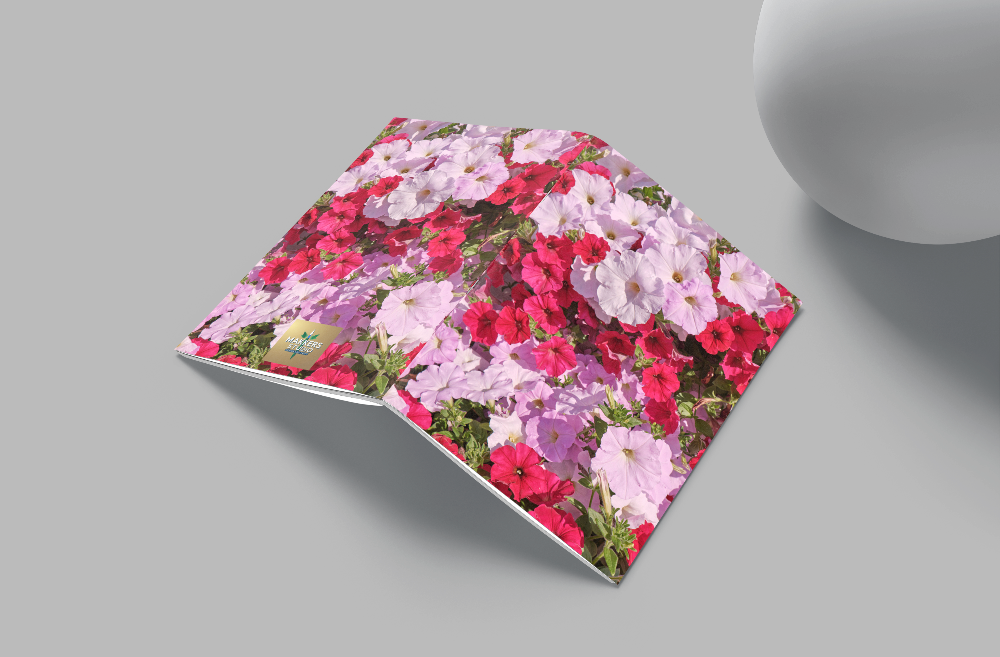 Floral notebook on a gray surface