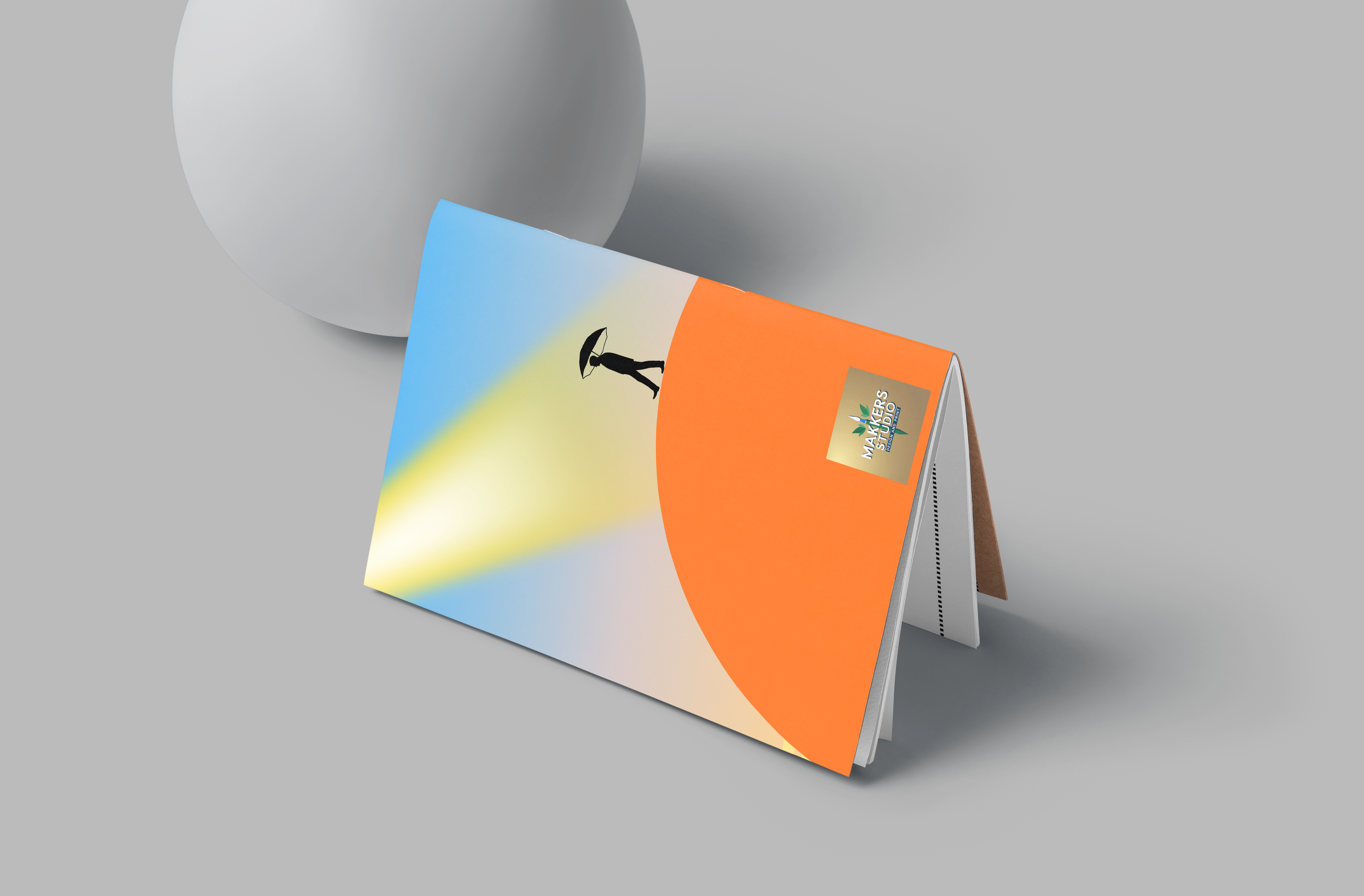 Colorful book with abstract design on a gray background