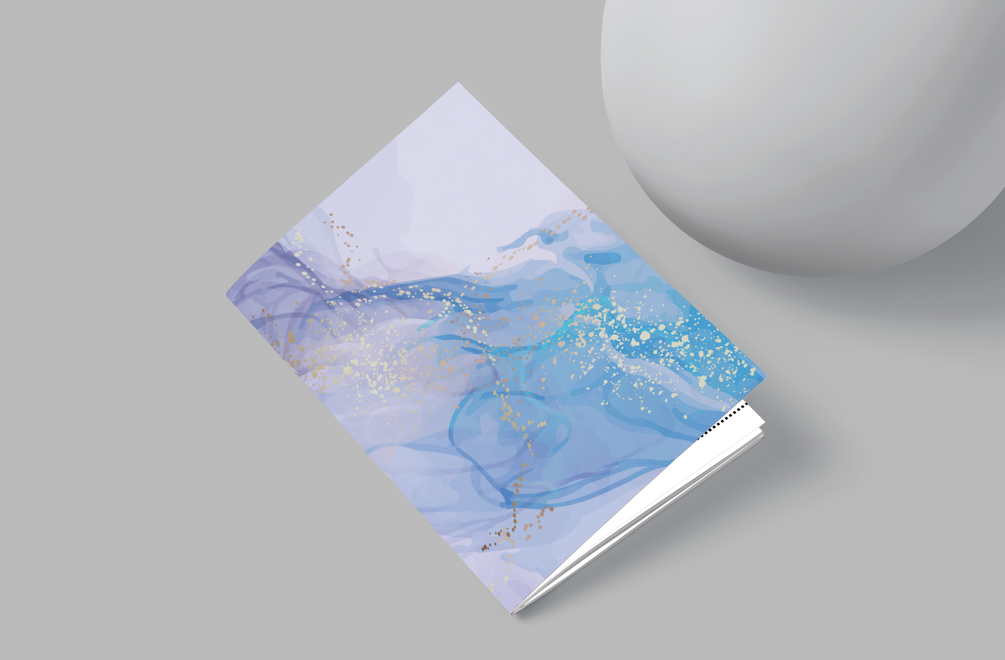Notebook with blue abstract design on a gray background