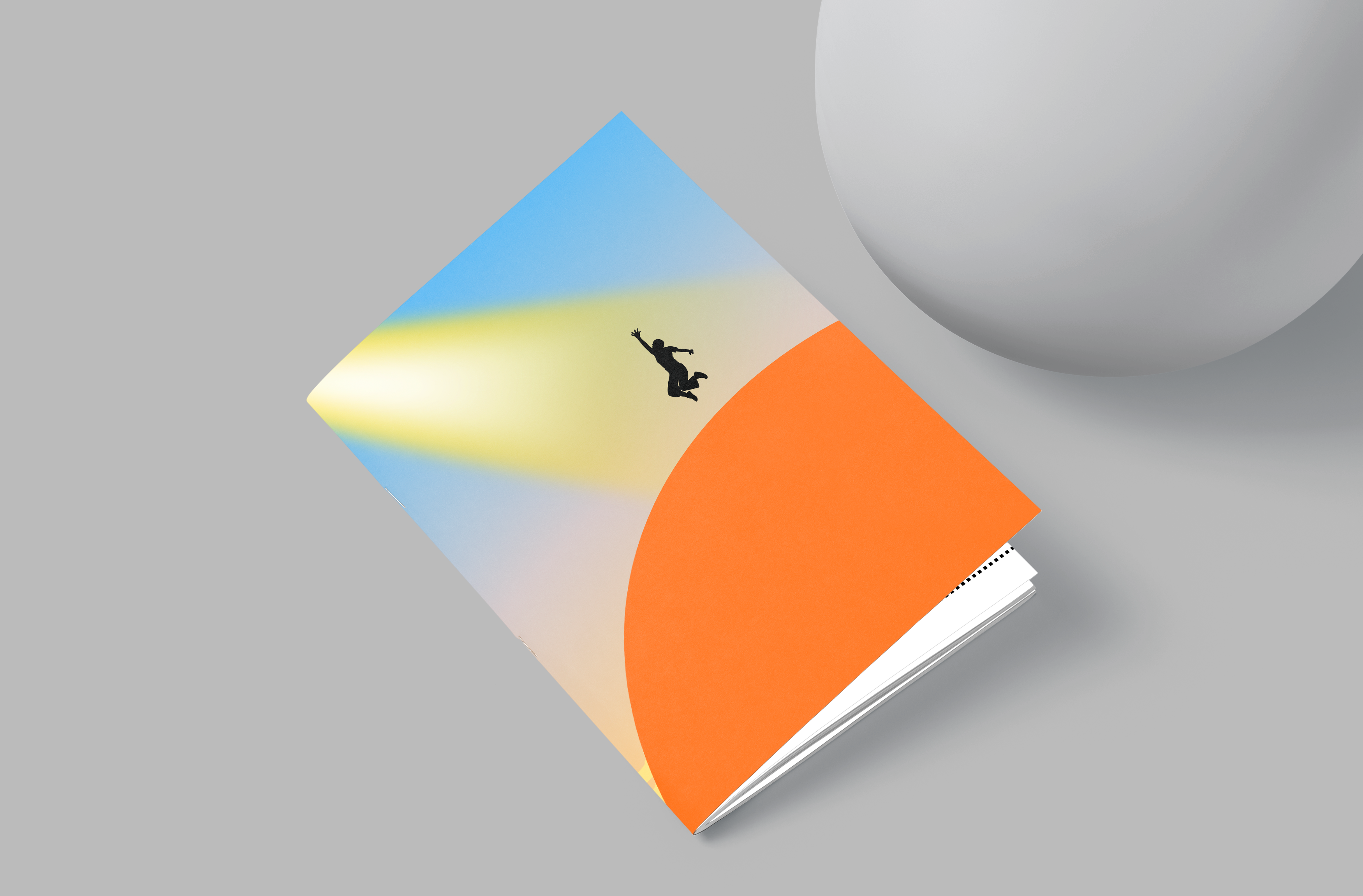 Colorful book with a geometric design on a gray background